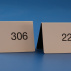L: 85mm/H: 60mm, 0,8mm weiß/schwarz, 1 x abgekantet, inkl. Lasergravur